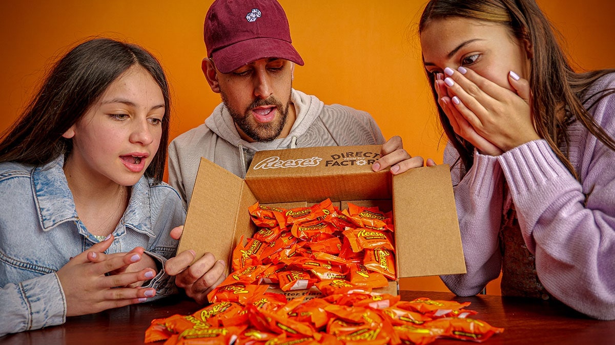 Person Pouring out Reese's Cups